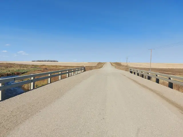 Gravel road bridge over Long Creek on Highway 350